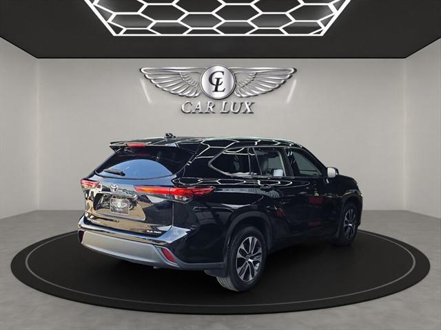 used 2021 Toyota Highlander car, priced at $28,979