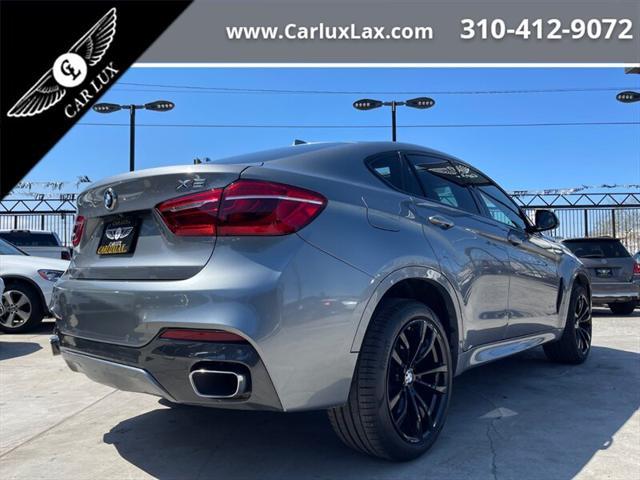 used 2019 BMW X6 car, priced at $29,650