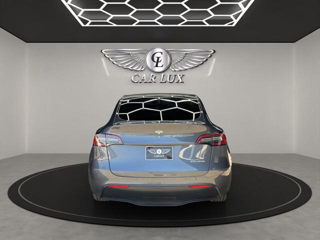 used 2023 Tesla Model Y car, priced at $20,979