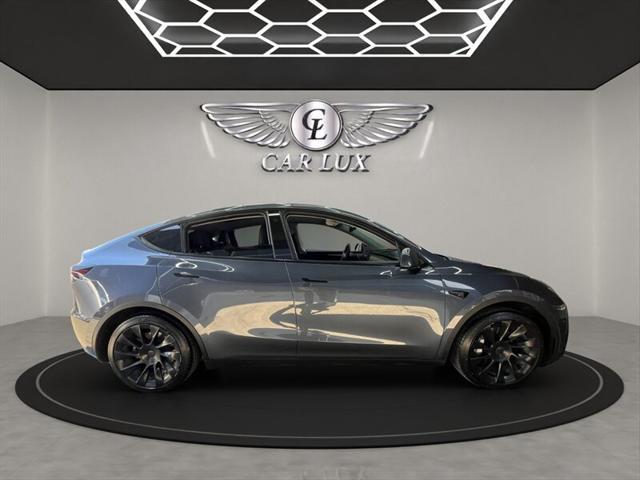 used 2023 Tesla Model Y car, priced at $20,979