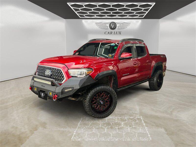 used 2018 Toyota Tacoma car, priced at $28,691