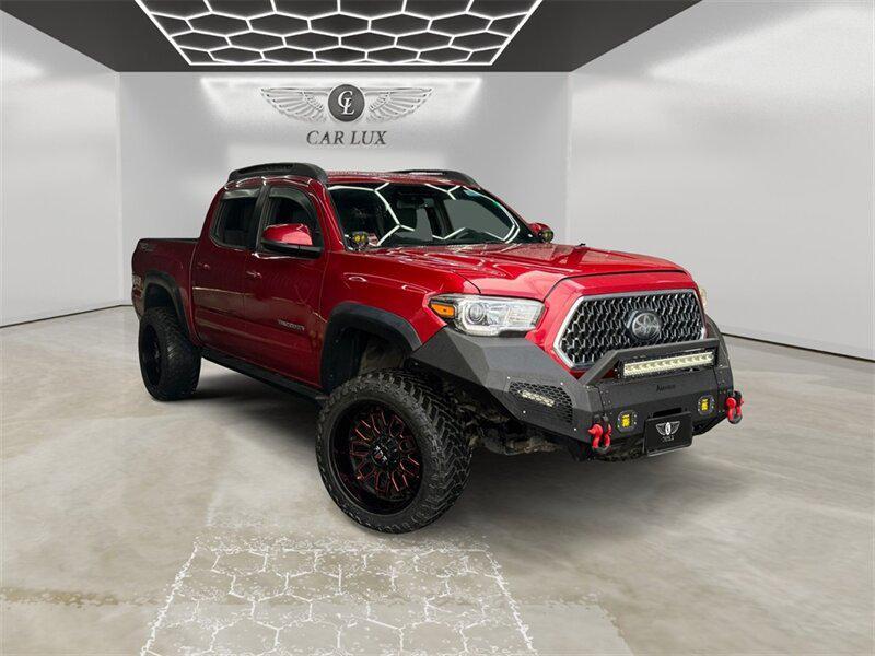 used 2018 Toyota Tacoma car, priced at $28,691