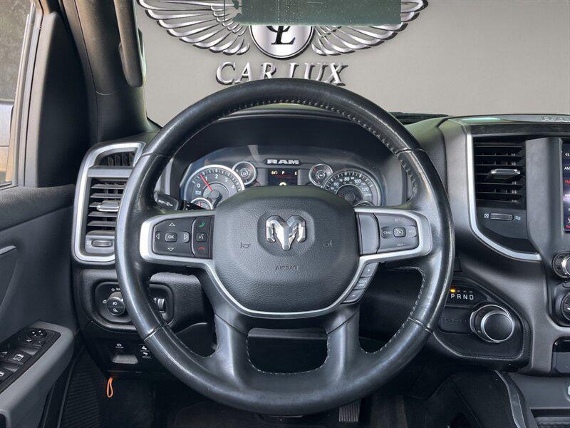 used 2021 Ram 1500 car, priced at $26,992