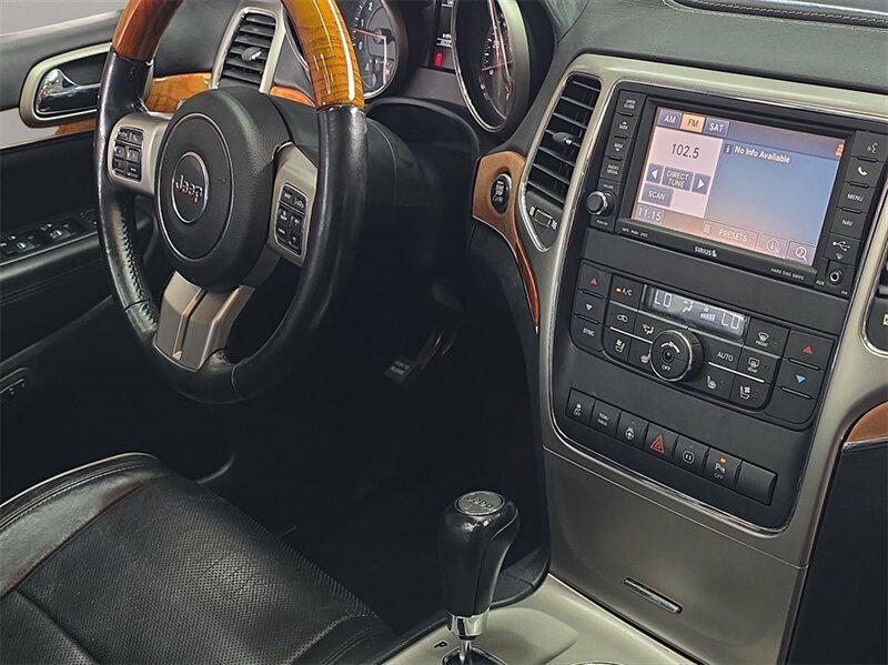 used 2012 Jeep Grand Cherokee car, priced at $11,391