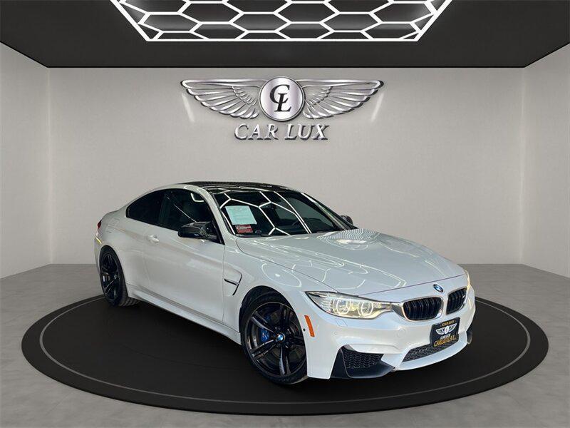 used 2015 BMW M4 car, priced at $37,991