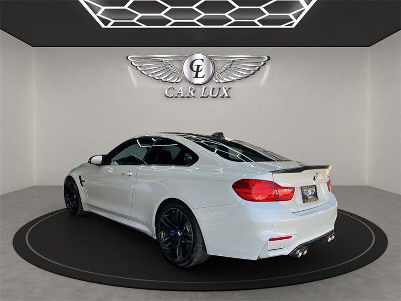 used 2015 BMW M4 car, priced at $37,991