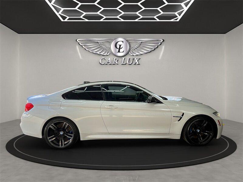 used 2015 BMW M4 car, priced at $37,991