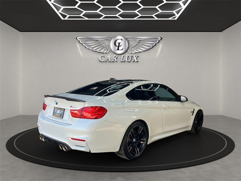 used 2015 BMW M4 car, priced at $37,991