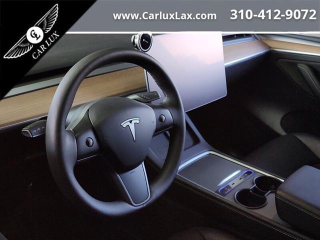 used 2023 Tesla Model Y car, priced at $32,500