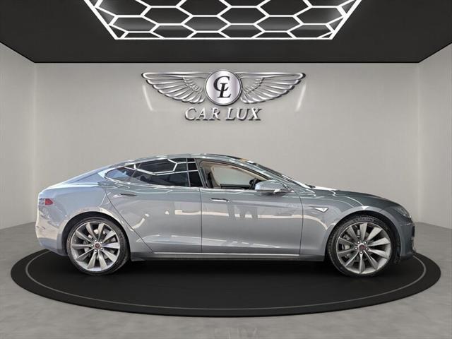 used 2014 Tesla Model S car, priced at $13,979