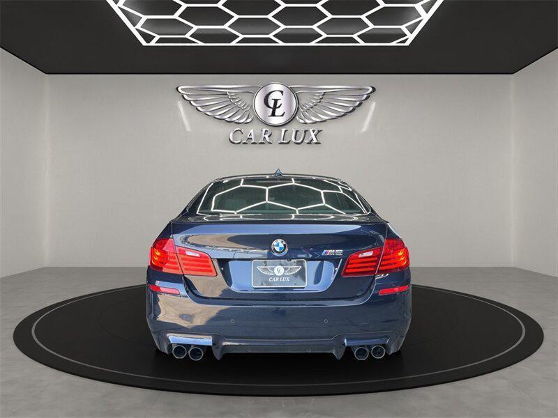 used 2015 BMW M5 car, priced at $36,979