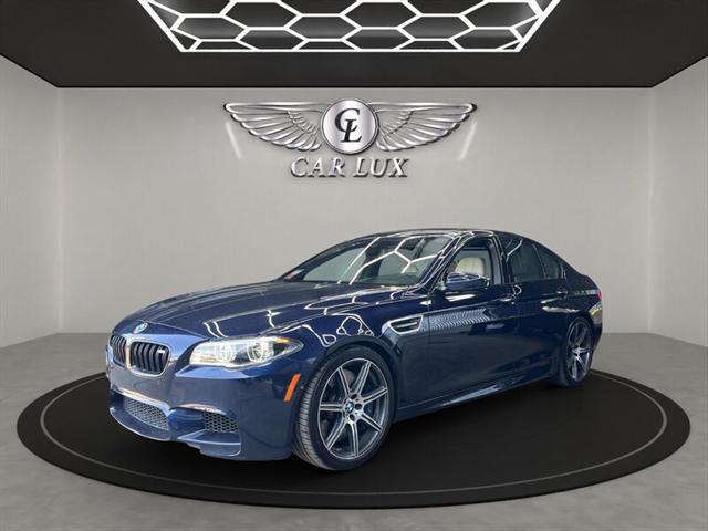 used 2015 BMW M5 car, priced at $39,979