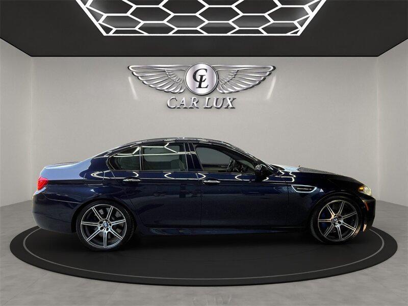 used 2015 BMW M5 car, priced at $36,979