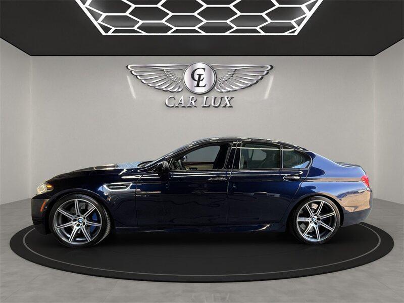 used 2015 BMW M5 car, priced at $36,979