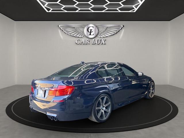 used 2015 BMW M5 car, priced at $39,979