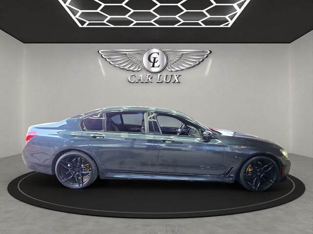 used 2016 BMW 740 car, priced at $18,979