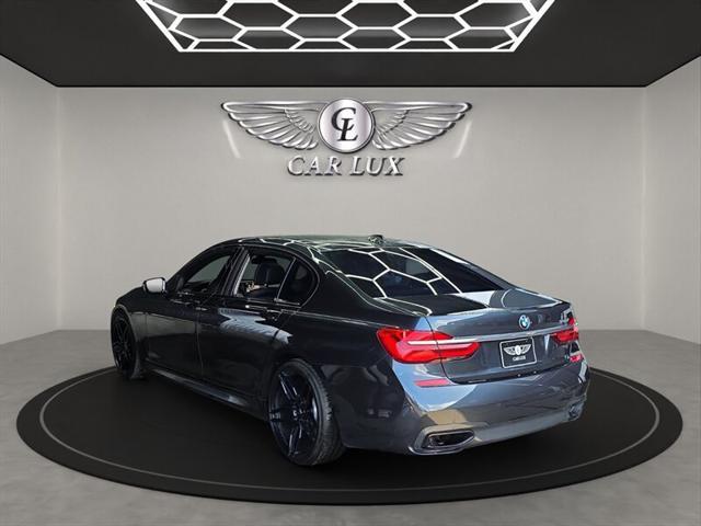 used 2016 BMW 740 car, priced at $18,979