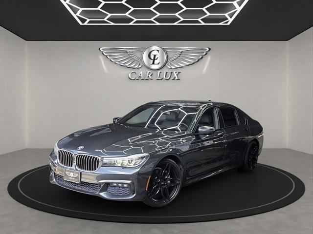 used 2016 BMW 740 car, priced at $18,979