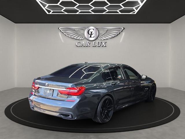 used 2016 BMW 740 car, priced at $18,979