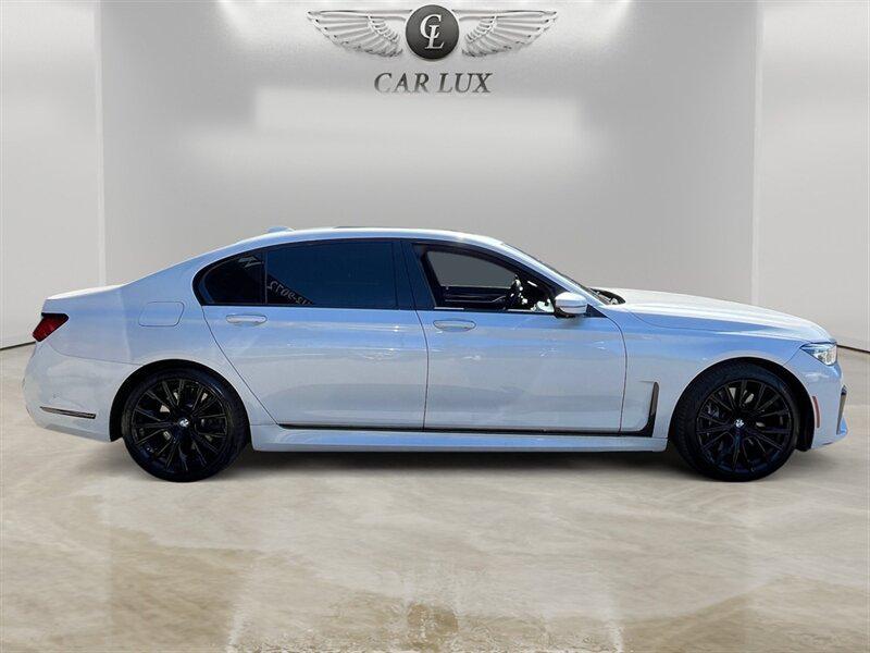 used 2021 BMW 750 car, priced at $37,991