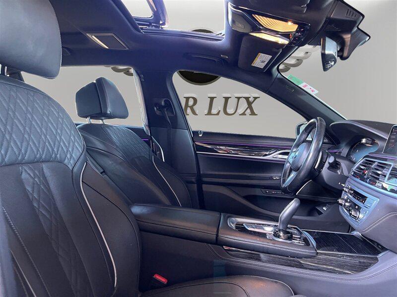 used 2021 BMW 750 car, priced at $37,991