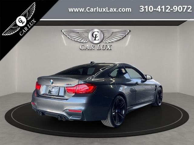 used 2018 BMW M4 car, priced at $42,988