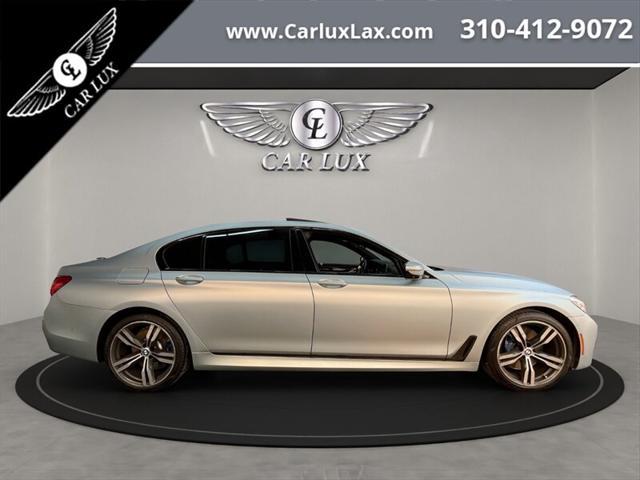used 2018 BMW 750 car, priced at $32,979
