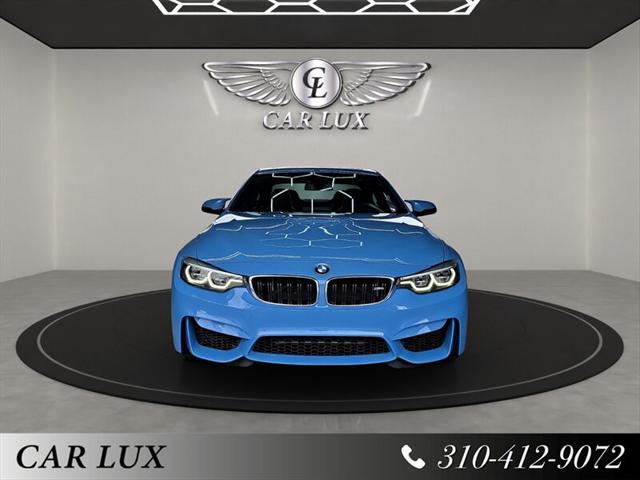 used 2018 BMW M4 car, priced at $40,455