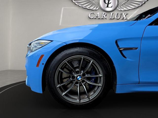 used 2018 BMW M4 car, priced at $40,455