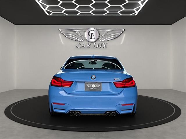 used 2018 BMW M4 car, priced at $40,455