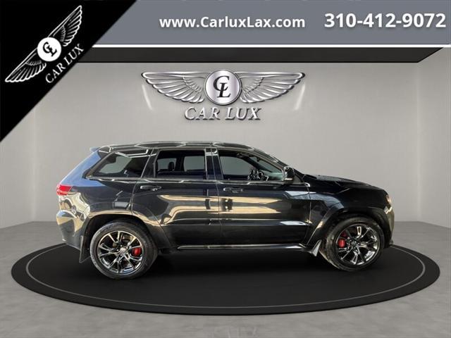 used 2014 Jeep Grand Cherokee car, priced at $32,979