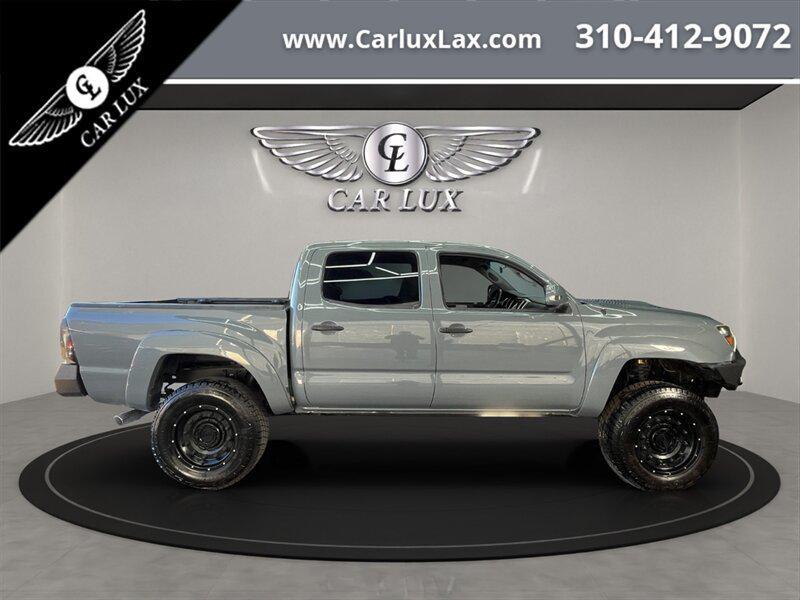 used 2014 Toyota Tacoma car, priced at $22,678