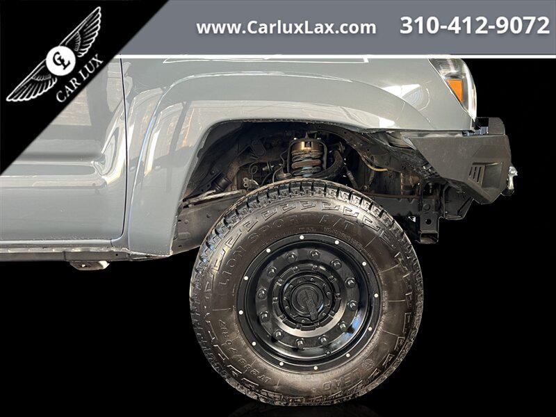 used 2014 Toyota Tacoma car, priced at $22,678