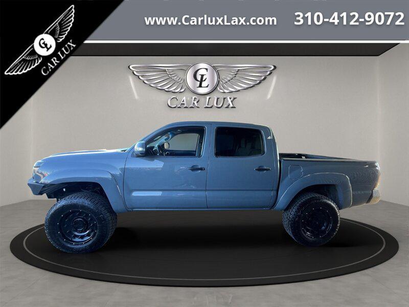 used 2014 Toyota Tacoma car, priced at $22,678