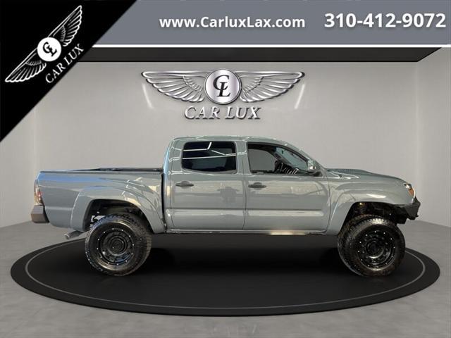 used 2014 Toyota Tacoma car, priced at $24,979