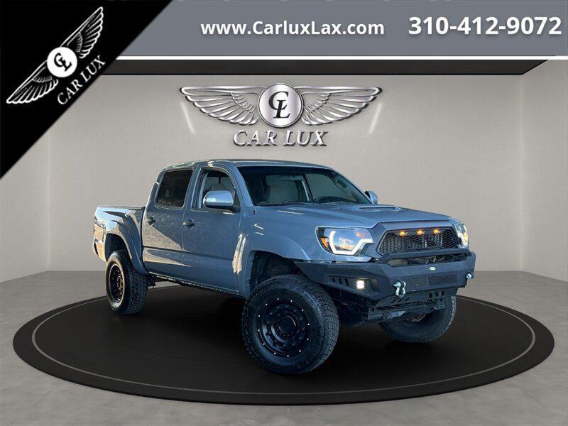 used 2014 Toyota Tacoma car, priced at $22,678