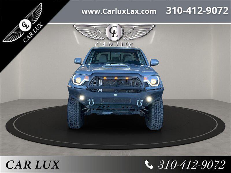 used 2014 Toyota Tacoma car, priced at $22,678