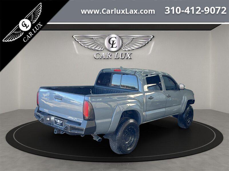 used 2014 Toyota Tacoma car, priced at $22,678