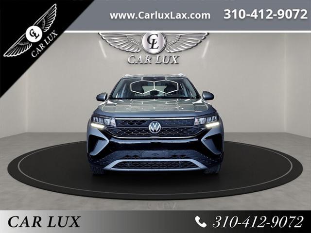 used 2022 Volkswagen Taos car, priced at $14,455