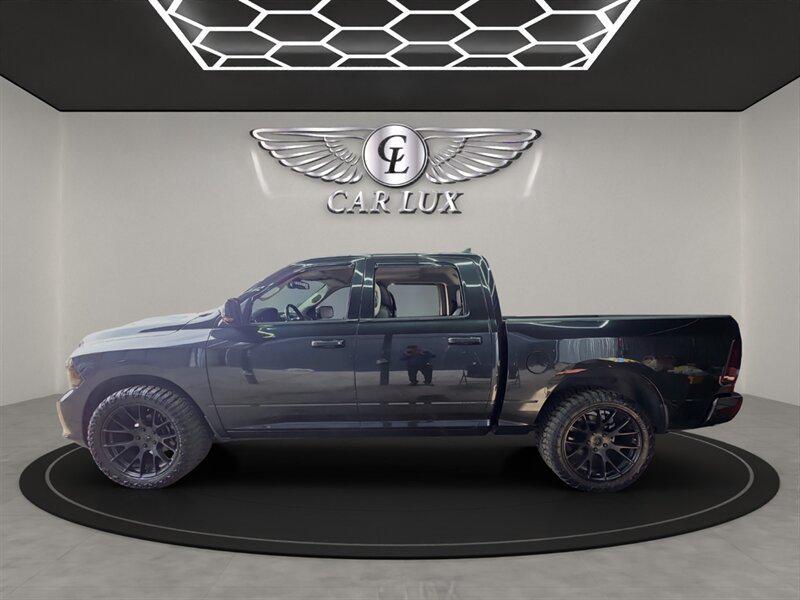 used 2015 Ram 1500 car, priced at $24,997