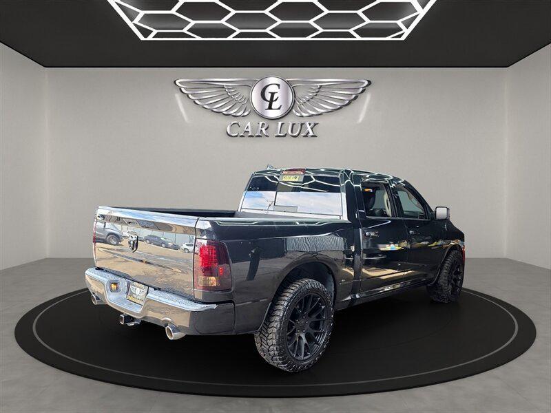 used 2015 Ram 1500 car, priced at $24,997