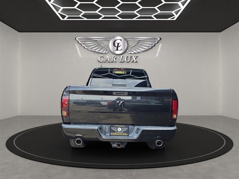 used 2015 Ram 1500 car, priced at $24,997