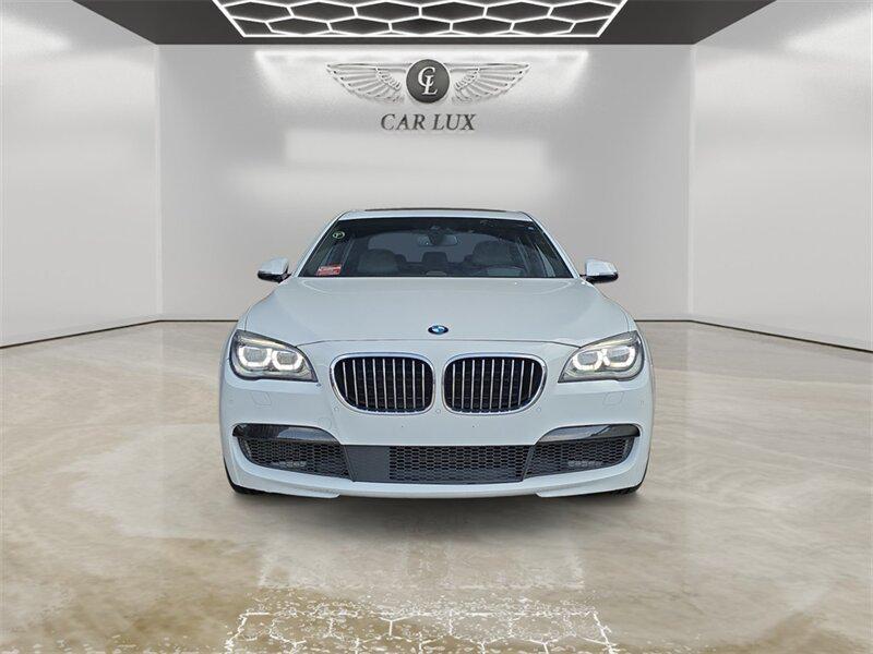 used 2015 BMW 750 car, priced at $18,691
