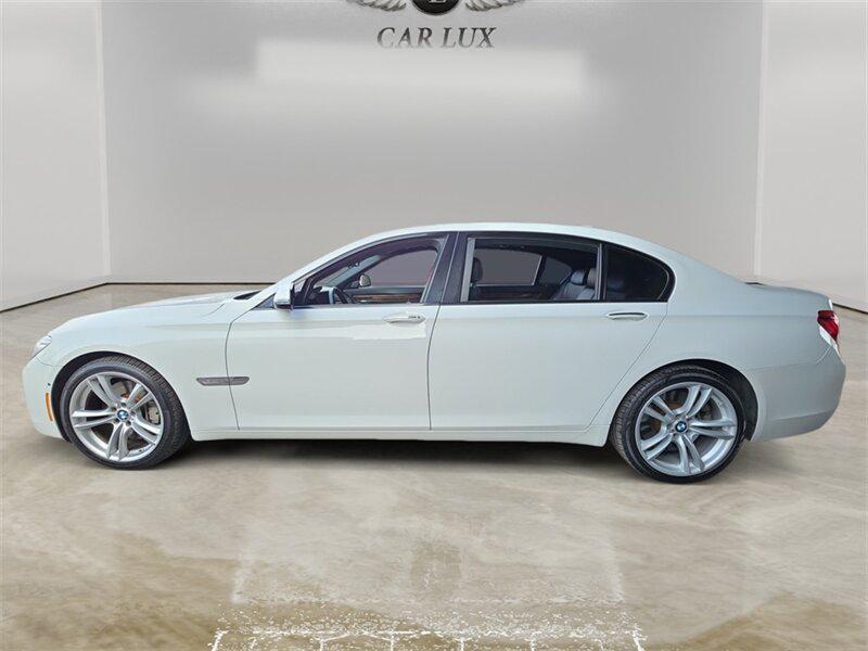 used 2015 BMW 750 car, priced at $18,691