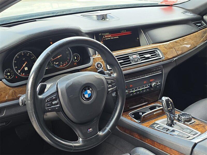 used 2015 BMW 750 car, priced at $18,691