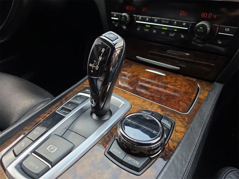 used 2015 BMW 750 car, priced at $18,691