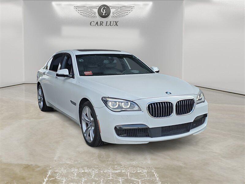 used 2015 BMW 750 car, priced at $18,691
