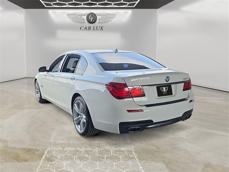 used 2015 BMW 750 car, priced at $18,691