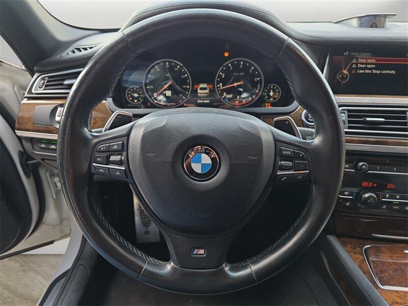 used 2015 BMW 750 car, priced at $18,691