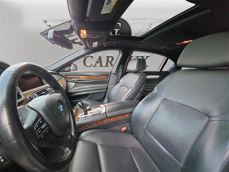 used 2015 BMW 750 car, priced at $18,691